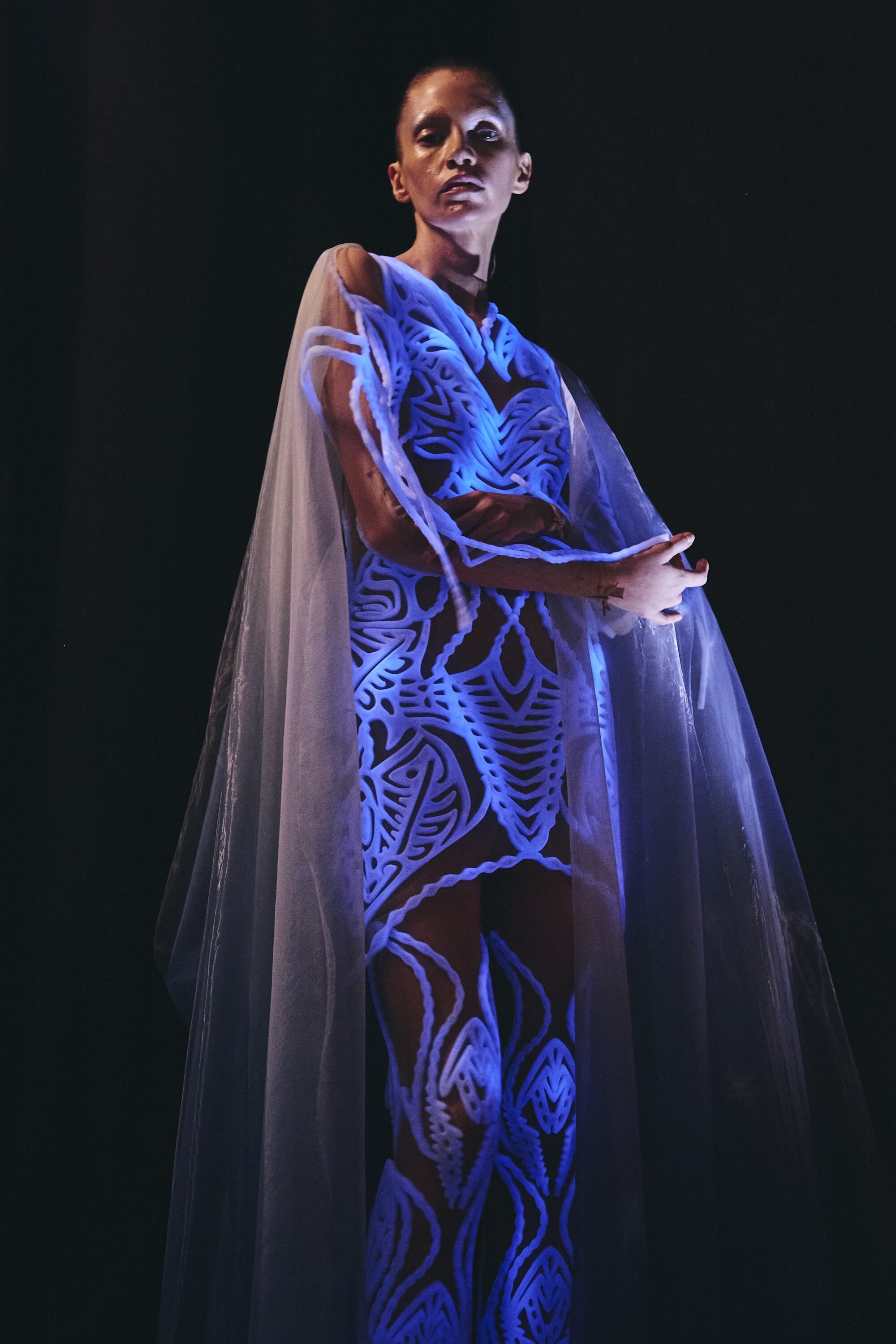 Iris van Herpen Sympoiesis couture gown inspired by symbiosis and marine ecosystems, blending 3D-printed structures with flowing organic fabrics.