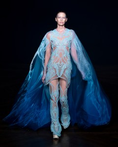 Iris van Herpen Sympoiesis couture gown inspired by symbiosis and marine ecosystems, blending 3D-printed structures with flowing organic fabrics.