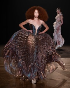 Iris van Herpen Sympoiesis couture gown inspired by symbiosis and marine ecosystems, blending 3D-printed structures with flowing organic fabrics.