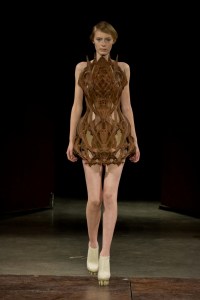 Iris van Herpen Micro collection couture design inspired by microorganisms, featuring microscopic patterns translated into sculptural garments.