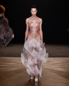 Iris van Herpen Sympoiesis couture gown inspired by symbiosis and marine ecosystems, blending 3D-printed structures with flowing organic fabrics.